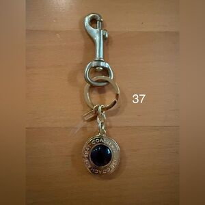 Vintage Coach Bag Charm with Purple Stone. (37)
